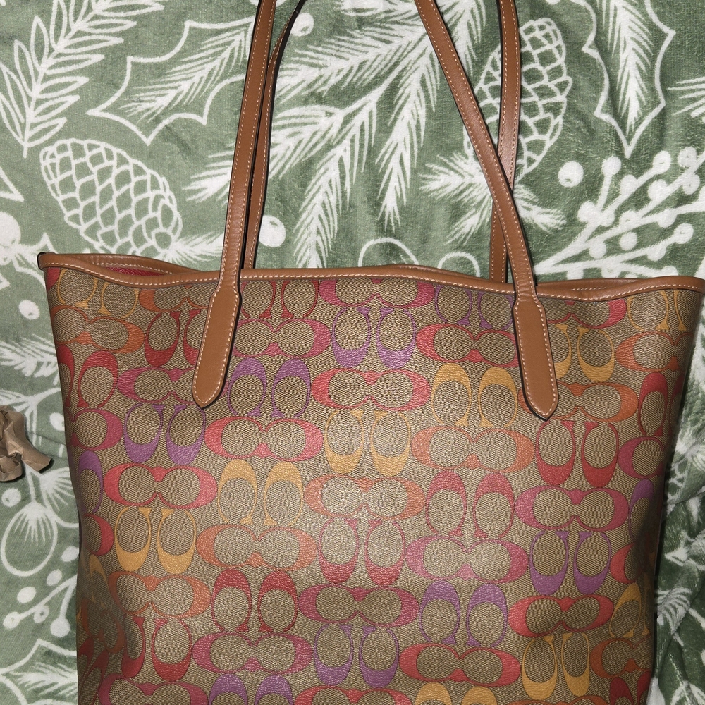 COACH SIGNATURE C CITY TOTE IN PINK, ORANGE, AND PURPLE WITH BROWN BACKGROUND - Picture 2 of 7
